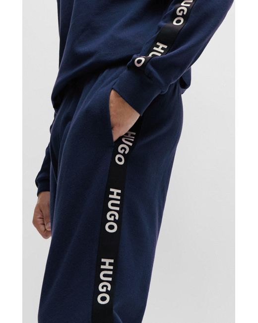 HUGO Blue Cuffed Tracksuit Bottoms In Organic Cotton With Logo Tape for men
