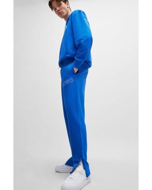 HUGO Loose-Fit Jogginghose aus Baumwoll-Terry mit Outline-Logo in Blue für Herren
