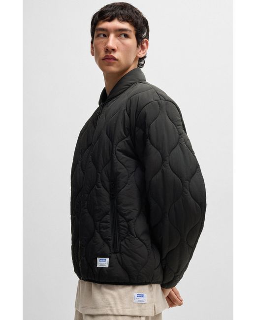 HUGO Black Water-Repellent Quilted Jacket With Logo Badge for men