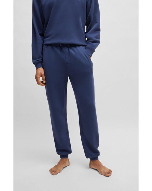 Boss Blue Cotton-terry Tracksuit Bottoms With Flocked Logo for men