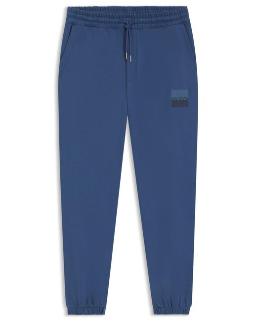 HUGO Jogginghose Aus Baumwoll-Terry Mit Split-Logo in Blue für Herren