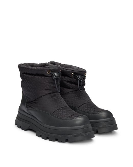 Boss Slanke Laarzen Met Monogramdessin En Leren Details in het Black