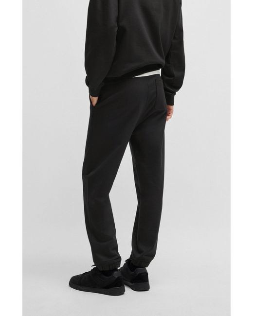 HUGO S Dilbero Cotton-terry Tracksuit Bottoms With Smoke Logo Black for men