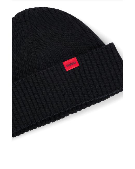HUGO Black Ribbed Beanie Hat With Red Logo Label for men