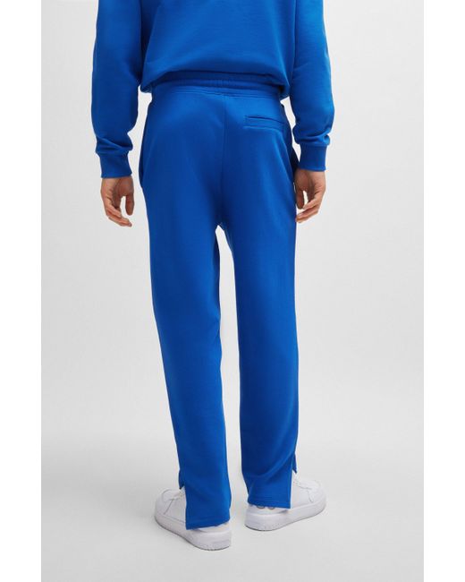 HUGO Loose-Fit Jogginghose aus Baumwoll-Terry mit Outline-Logo in Blue für Herren