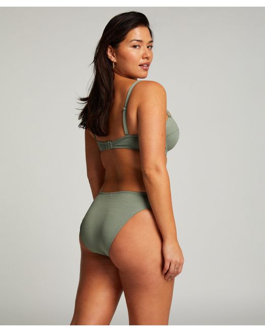 Top de bikini con aros, sin tiras y acolchado Scallop Hunkemöller de color Green