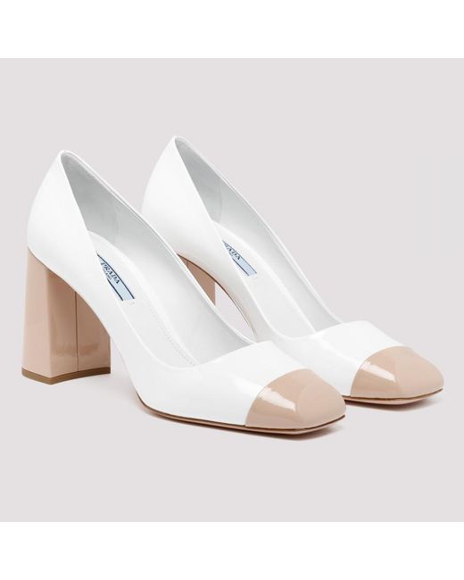 cream leather pumps