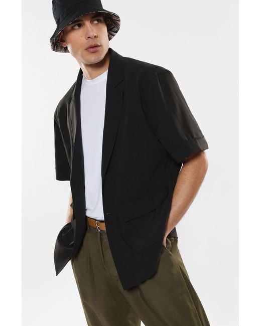 Veste à boutonnage simple, manches courtes et poches plaquées Imperial pour homme en coloris Black