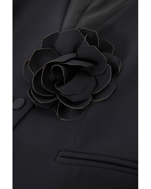 Gilet à boutonnage simple et fleur appliquée Imperial en coloris Black