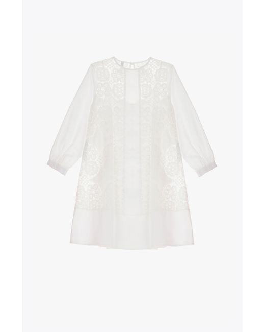 Mini-robe à col rond et dentelle effet transparent Imperial en coloris White