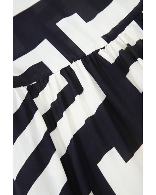 Mini-robe avec motif géométrique et ceinture à nouer Imperial en coloris White