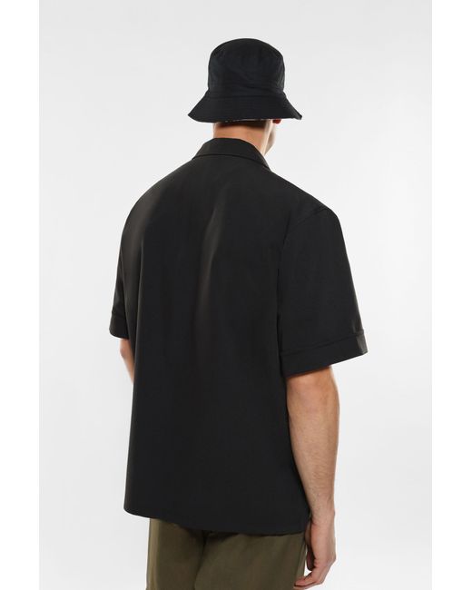 Veste à boutonnage simple, manches courtes et poches plaquées Imperial pour homme en coloris Black