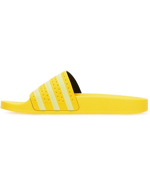 adidas yellow flip flops