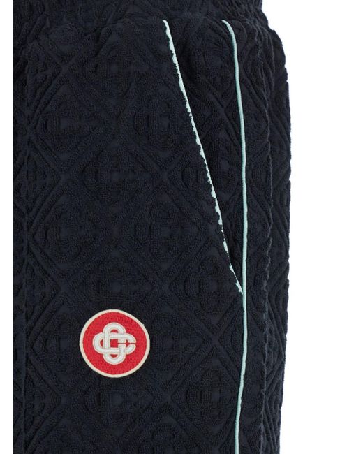 Casablanca Blue Pants With All-Over Embossed Monogram And Drawstring Waist for men