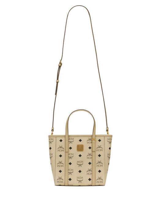 MCM Handbags in Natural | Lyst