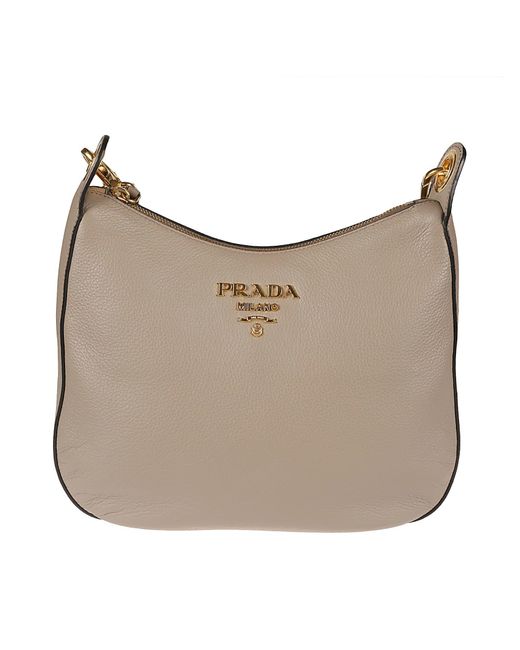 Prada Logo Embossed Top Zip Shoulder Bag in Natural Lyst