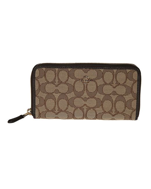 COACH Logo Plaque Zip Around Wallet in Brown - Lyst