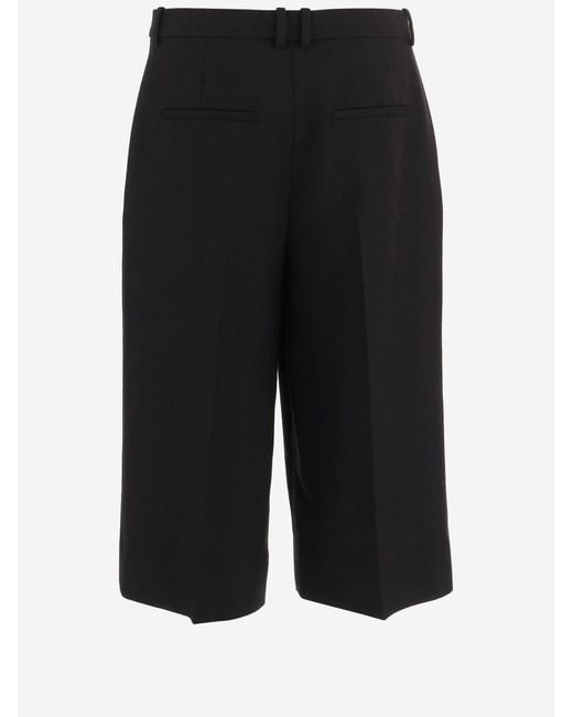 Saint Laurent Black Cropped Wool Trousers With Pleats