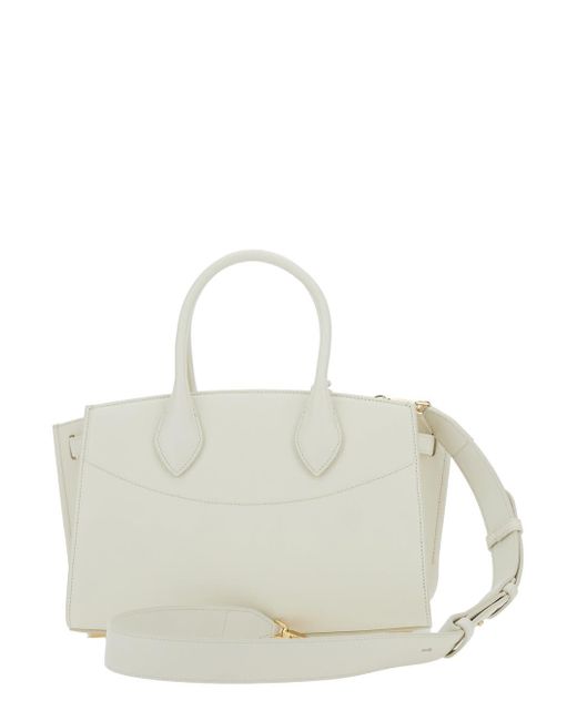 Ferragamo White Soft Handbag With Adjustable And Removable Shoulder Strap And Removable Logo Tag On The Front
