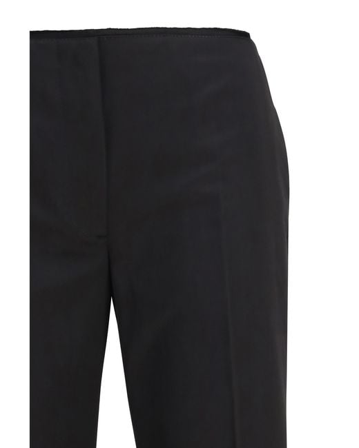 Totême Black Pants Kick Flare Raw-Edge Cotton Trousers