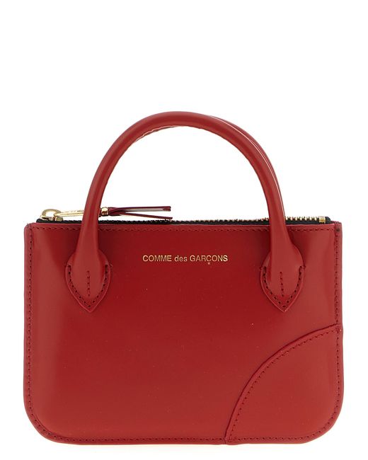 Comme des Garçons Red Handles