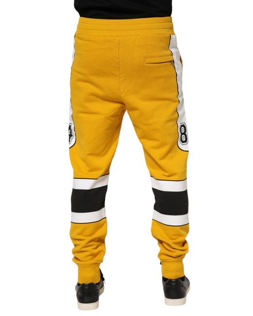 Dolce & Gabbana Yellow Striped Graphic Pants for men