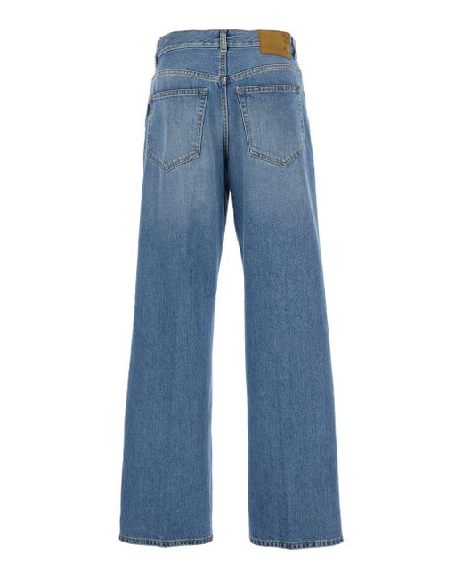 Haikure Blue Jeans With Five Pocket Design And Logo Patch On The Back