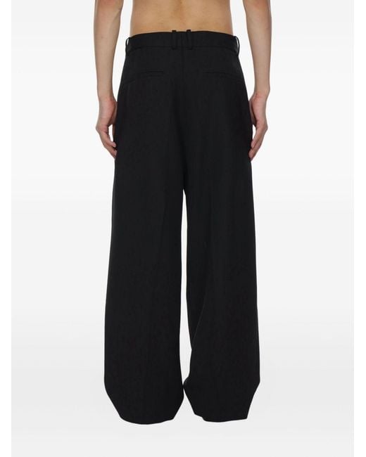 Studio Nicholson Black Trousers Lines for men