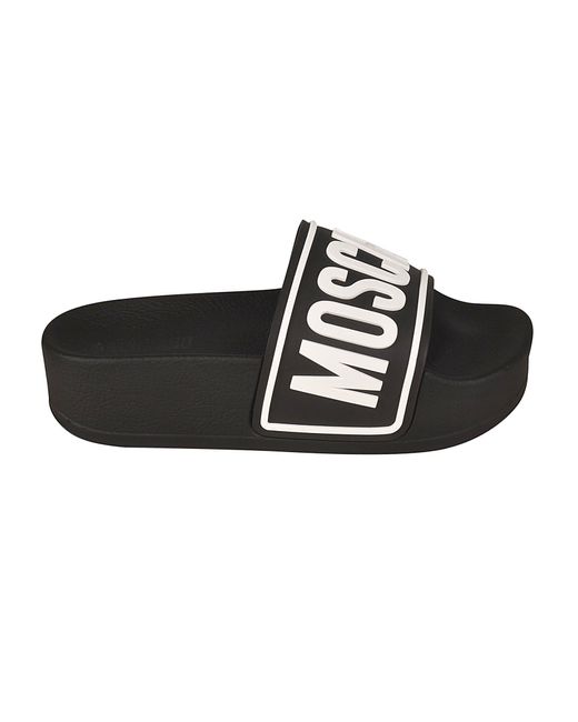 white platform sliders