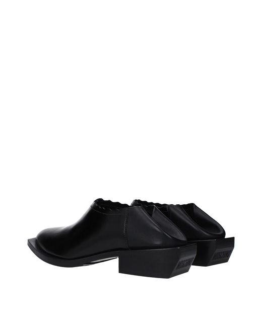 Moschino Black Leather Mules