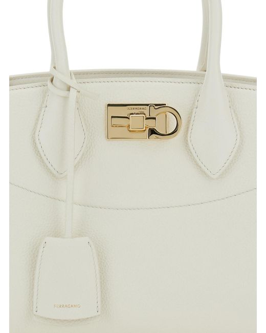 Ferragamo White Soft Handbag With Adjustable And Removable Shoulder Strap And Removable Logo Tag On The Front
