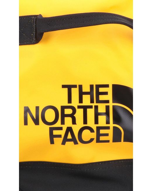 The North Face Yellow Small Duffel Base Camp Bag for men