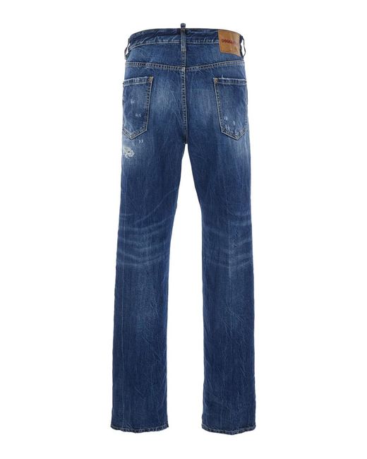 DSquared² Blue Jeans 642 With All-Over Ripped Details And Logo Patch On The Back for men