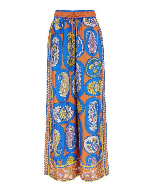 ALÉMAIS Blue Luis Pants With All-Over Graphic Print