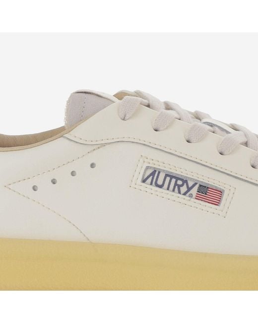 Autry White Low-Top Leather Sneakers With Padded Heel And Panel Design for men