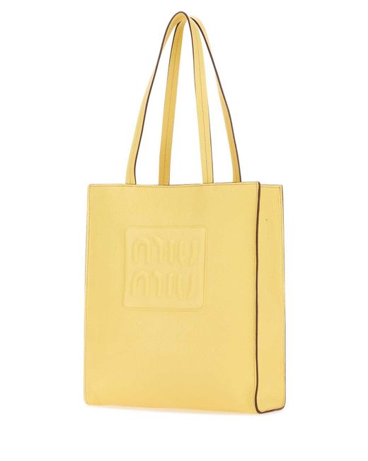 Miu Miu Yellow Handbags.