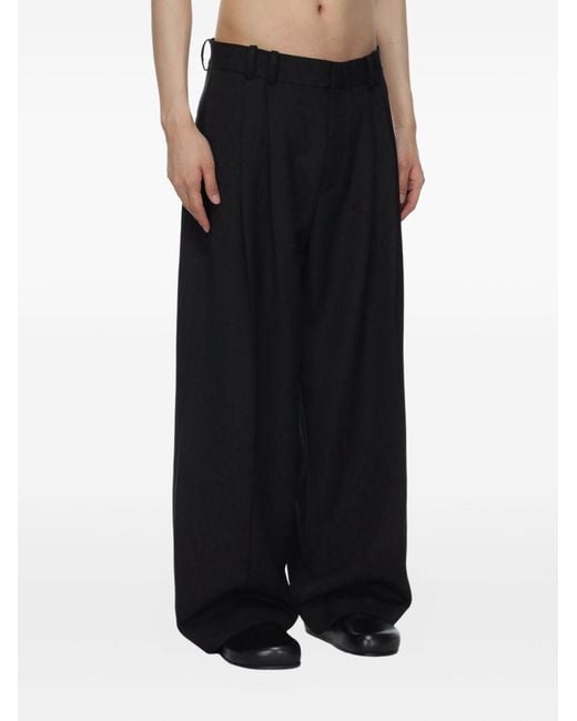 Studio Nicholson Black Trousers Lines for men