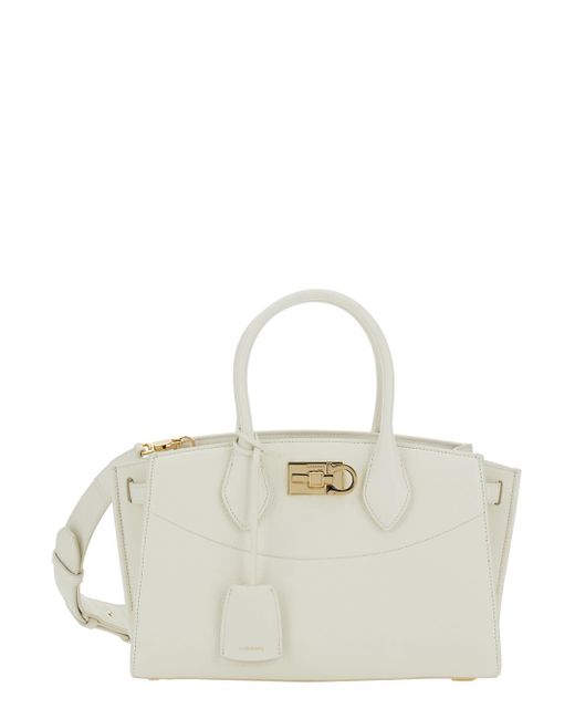 Ferragamo White Soft Handbag With Adjustable And Removable Shoulder Strap And Removable Logo Tag On The Front