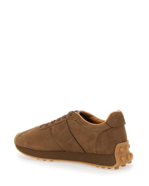 Tod's Brown Low Top Sneakers With Cleat Details On Heel And Sole