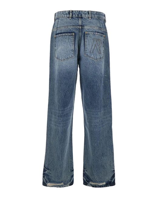 Represent Blue R3 Jeans With Ripped Details On The Front And Logo Embroidery On The Rear for men