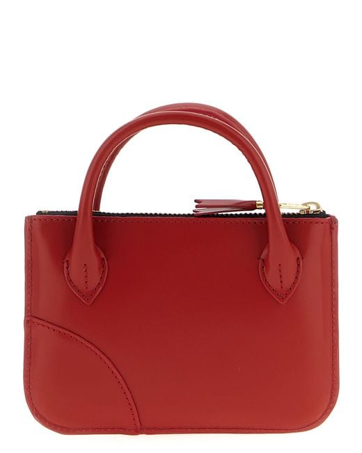 Comme des Garçons Red Handles