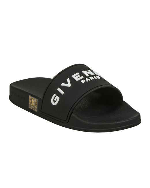 Givenchy Logo Embossed Flat Sliders in Black Lyst