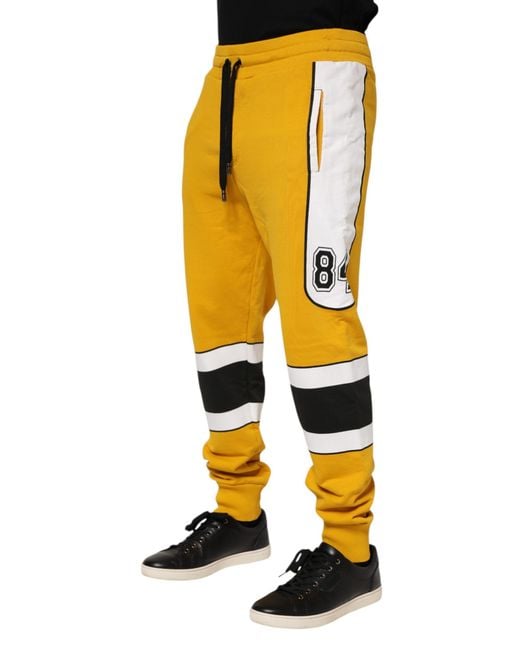 Dolce & Gabbana Yellow Striped Graphic Pants for men
