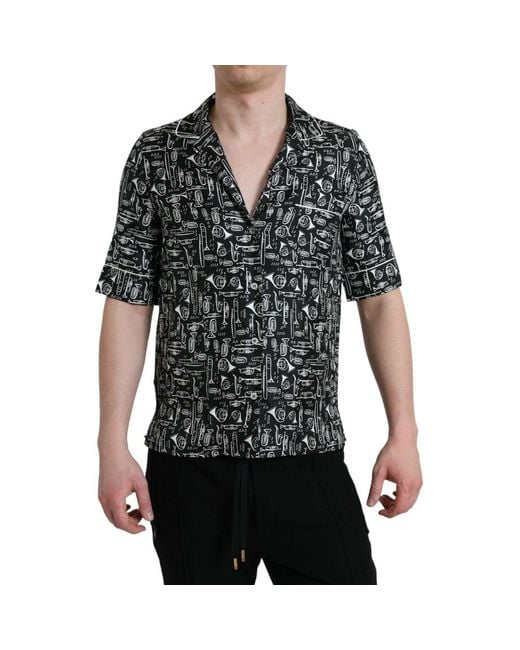 Dolce & Gabbana Black Elegant Silk Polo T-Shirt With Trumpet Print for men