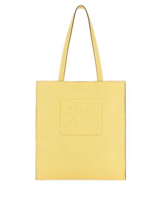 Miu Miu Yellow Handbags.