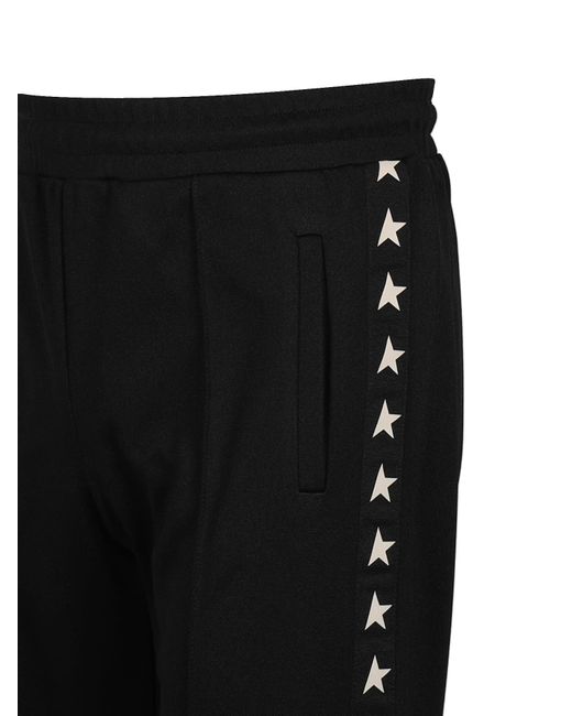 Golden Goose Deluxe Brand Black Jogging Trousers With Contrasting Stars for men