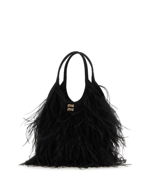 Miu Miu Black Handbags.