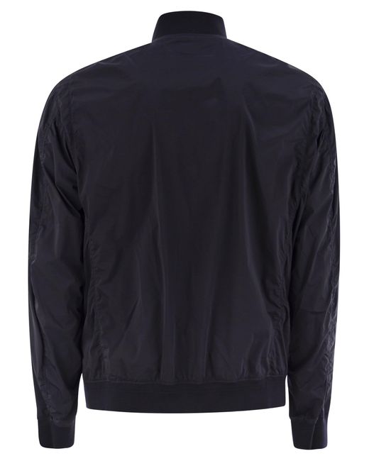 C P Company Blue Nycra-R Bomber Jacket With Lens for men