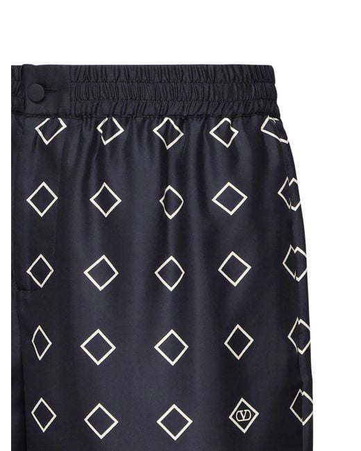 Valentino Garavani Black Printed Silk Bermuda Shorts for men