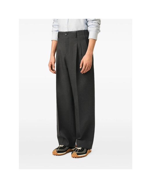 AMI Black Tailored Carrot Fit Wool Trousers for men